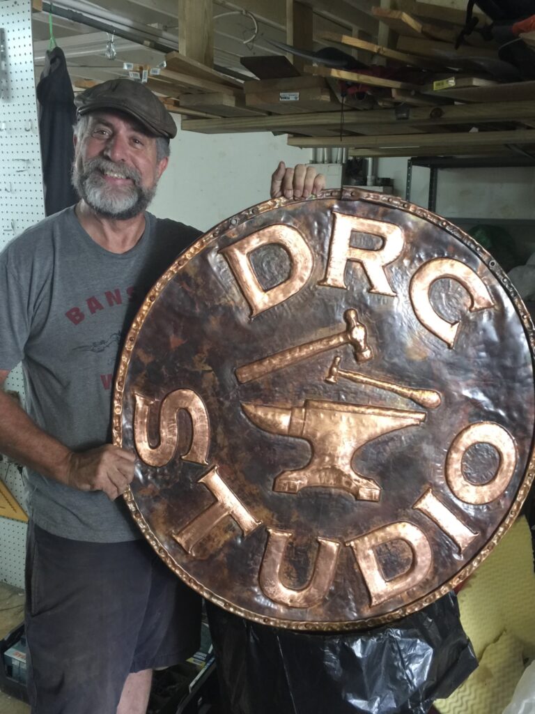 Photo of copper sculptor Ed Sharp