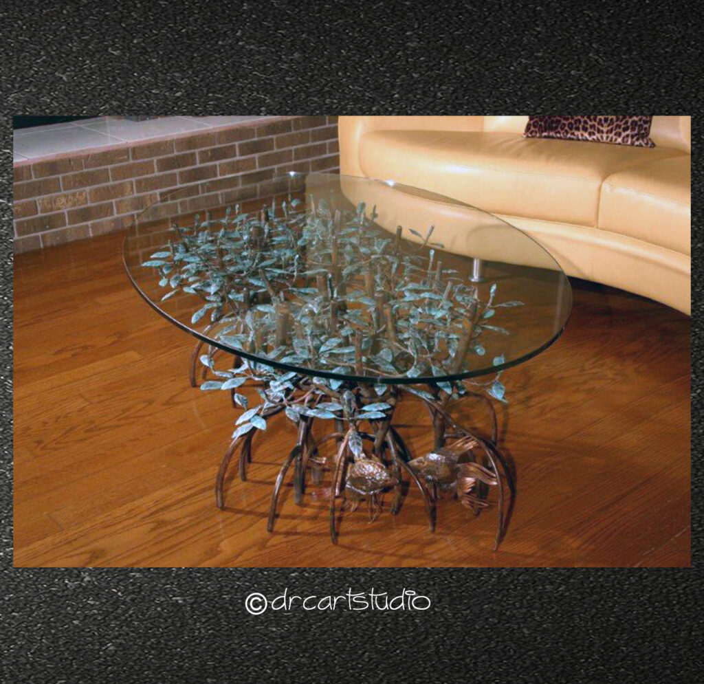 A photo of a hand made copper and glass coffee table