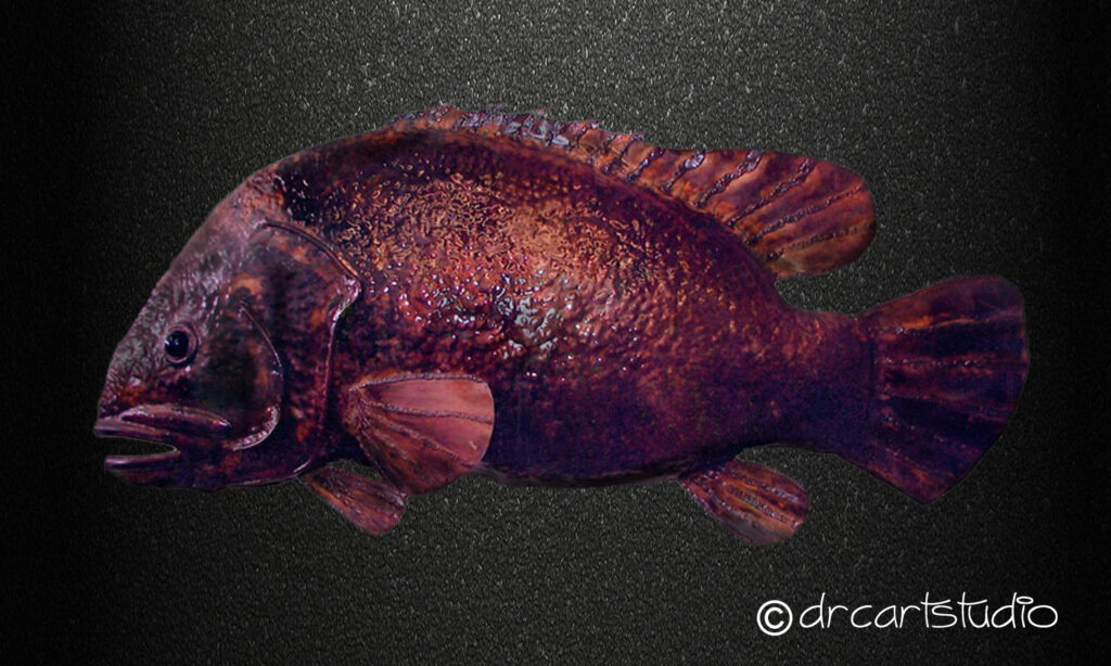 Photo of a hand made copper fish. A grouper