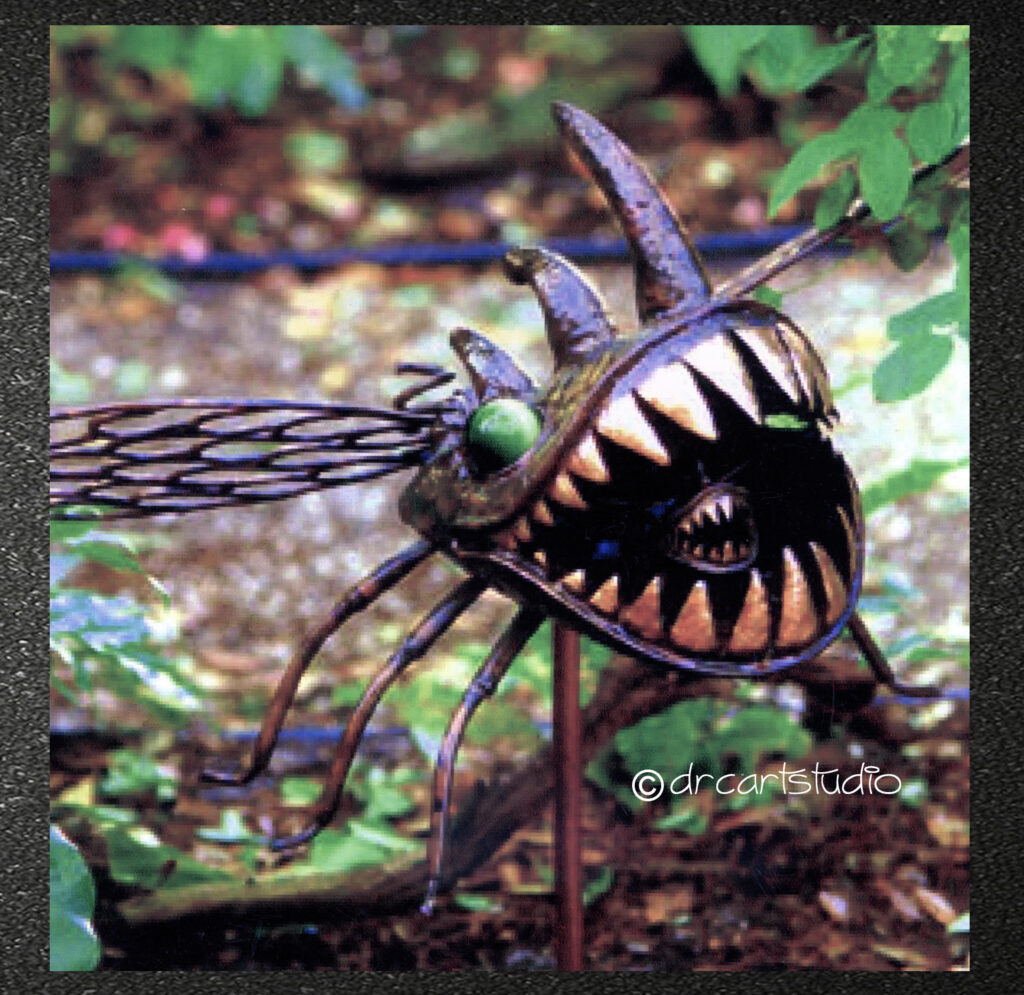 Photo of a hand made copper sculpture of a fixational noseeum